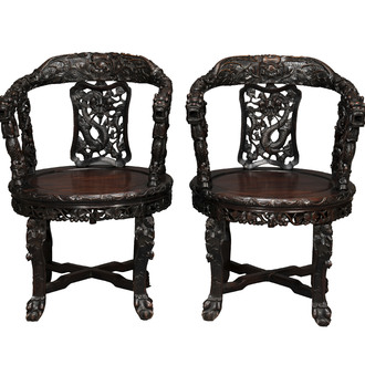 A pair of Chinese finely carved hongmu swivel chairs, Canton, 19th C.
