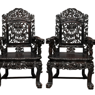A pair of Chinese finely carved hongmu armchairs, Canton, 19th C.