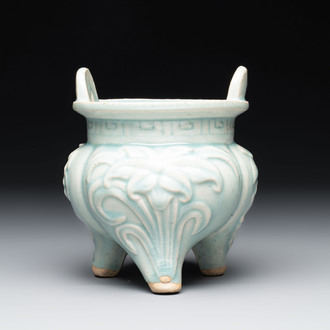A Chinese qingbai tripod censer with floral relief design, Song/Yuan
