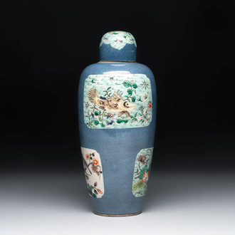 A Chinese famille verte powder-blue-ground 'fish and bird' vase and cover, 19th C.