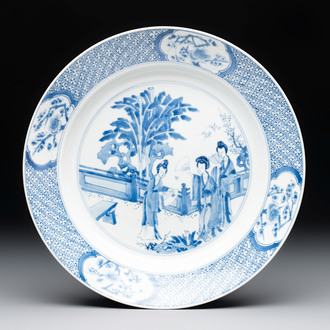 A Chinese blue and white 'elegant ladies' dish, Kangxi mark and of the period