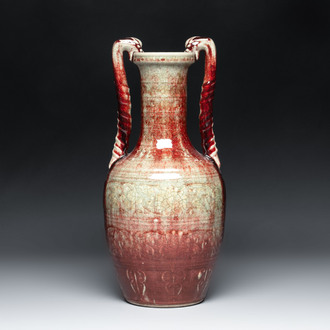 A Chinese peachbloom-glazed vase with dragon-form handles, 18th C.