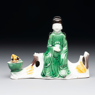 A Chinese verte biscuit 'scholar' brush rest, Kangxi