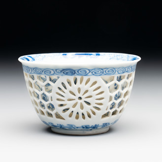 A Chinese blue and white reticulated double-walled cup, ruyi mark, Kangxi
