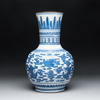 A Chinese blue and white copper-mounted 'cranes among clouds' vase, 18th C.