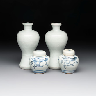 A pair of Chinese white-glazed vases and a pair of blue and white covered jars, Wanli mark and of the period
