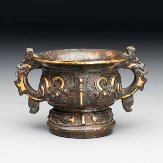 A Chinese archaistic gold and silver-inlaid bronze miniature censer, Ming