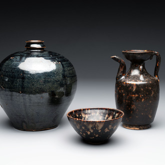 A Chinese Jizhou tortoiseshell-glazed tea bowl, a ewer and a black-glazed vase, Jin and later