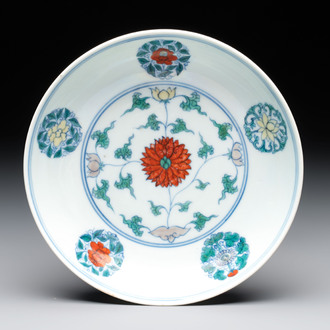 A Chinese doucai plate with stylized floral design, Chenghua mark, Kangxi/Yongzheng
