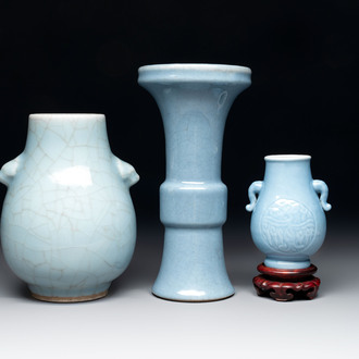 Three Chinese claire-de-lune vases, one with a wooden stand, Yongzheng mark, 19/20th C.