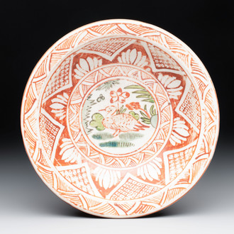 A Chinese Swatow wucai 'klapmuts' bowl with a duck, Ming