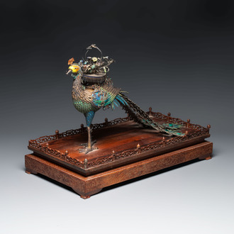 A large Chinese precious stone-inset and enamelled gilt-silver filigree peacock and flower basket on a wooden stand, Republic