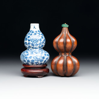 A Chinese blue and white double-gourd snuff bottle and a huali snuff bottle, Xuande and Qianlong mark, 18th C.