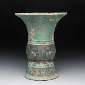 A Chinese archaic bronze wine vessel with taotie design, 'zun 尊', Western Zhou
