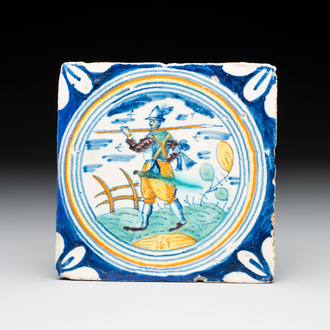 A polychrome Dutch Delft maiolica 'soldier' ​​medallion tile, late 16th C.