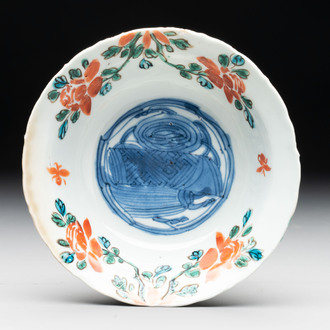 A rare Chinese iron-red and green-enamelled blue and white 'klapmuts' bowl, Wanli