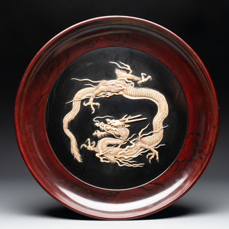 A large Japanese mother-of-pearl and bone-inlaid lacquer 'dragon' dish, Meiji, 19th C.