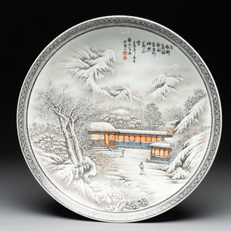 A large Chinese 'winter landscape' dish in the style of He Xuren 何許人, signed Rao Yongchang 饒永昌, dated 1902