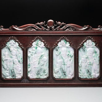 Four Chinese lavender and green jadeite 'Fu Lu Shou Quan 福祿壽全' plaques mounted in a hongmu frame, 19th/20th C.