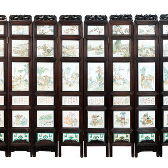 A rare Chinese eight-panel hongmu room divider with 48 qianjiang cai plaques, signed Jia Xingqing 贾醒卿, dated 1902