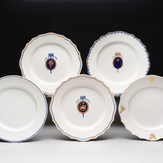 Five gilt-decorated and blue-enamelled Tournai porcelain plates, golden crossed swords and four crosses marks, 18th C.