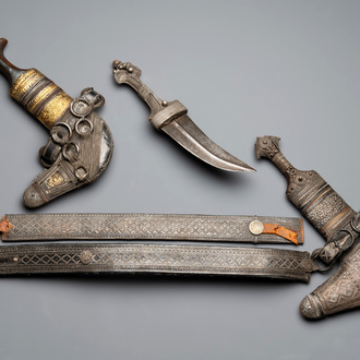 Three Omani Khanjars, one with Rhinoceros horn hilt, 19th C.