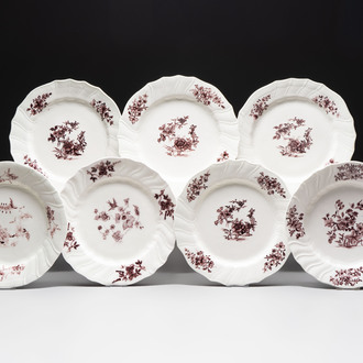 Seven manganese Tournai porcelain plates with floral design, 18th C.