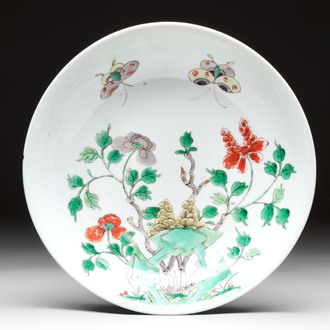 A Chinese famille verte 'peonies and butterflies' plate, Kangxi