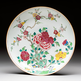 A Chinese famille rose 'peonies and plum blossoms' dish, Yongzheng