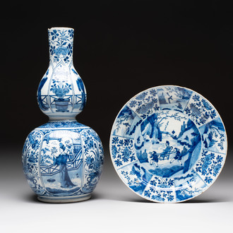 A blue and white Dutch Delft chinoiserie Kangxi-style 'Long Eliza' double gourd vase and a plate, early 18th C.