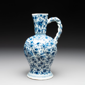 A fine blue and white Dutch Delft ewer with twisted rope handle, ca. 1700