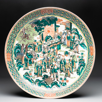 A massive Chinese famille verte dish with narrative design, 19th C.