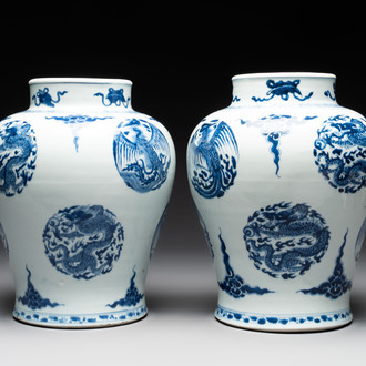 A pair of Chinese blue and white 'dragons and phoenixes' vases, Kangxi