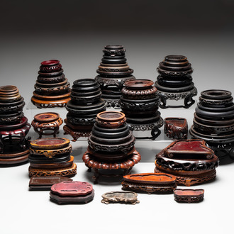 A collection of 51 Chinese wooden stands, 19/20th C.