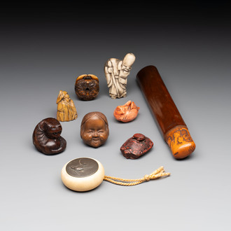 A varied collection of eight Japanese netsukes and a wooden opium pipe, signed Daimyo 大明, Hinode 日出 and Chikusen 竹仙, 19th C.