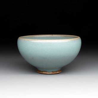 A small Chinese blue-glazed 'jun' tea cup with a wooden box, Song/Yuan
