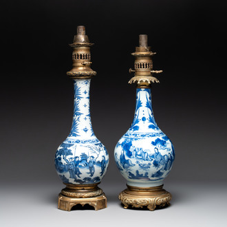 Two Chinese blue and white 'Wen Wang Fang Xian 文王訪賢' and 'Zhu Lin Qi Xian 竹林七賢' vases mounted as lamps, Transitional period