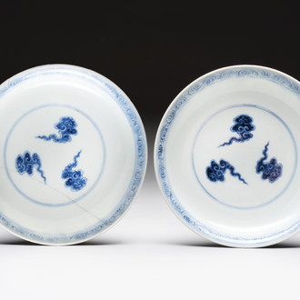 A pair of Chinese blue and white plates with clouds design, Xuande mark, 20th C.