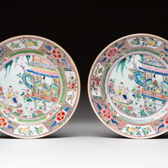 A pair of Chinese famille rose plates with a lady and boys in a boat, Yongzheng/Qianlong