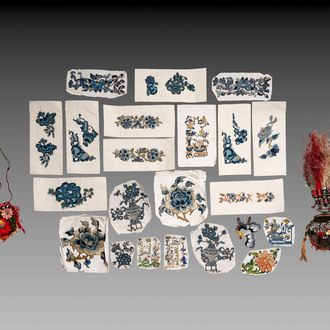22 Chinese embroidered silk ornaments, a headpiece and a pouch, 18/19th C.