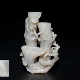 An extremely fine Chinese jade 'Three Friends of Winter' brush holder, Qianlong mark and of the period