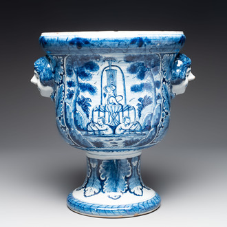 A large blue and white Dutch Delft garden vase with a putti fountain and Venus courting Adonis, 18th C.
