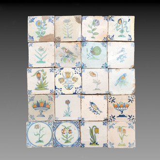 20 polychrome Dutch Delft tiles with birds, flowers and fruit bowls, 17th C.