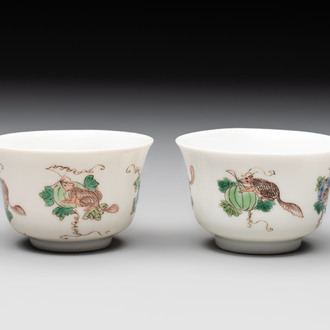 A pair of Chinese famille verte 'squirrels and melons' cups, Chenghua mark, Kangxi