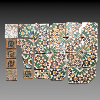 A varied collection of 24 polychrome Spanish tiles, Seville and Valencia, 15/16th C.