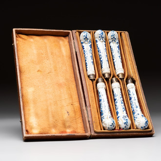 A set of six knives with Chinese gilt and blue-enamelled porcelain handles, in a case, Qianlong