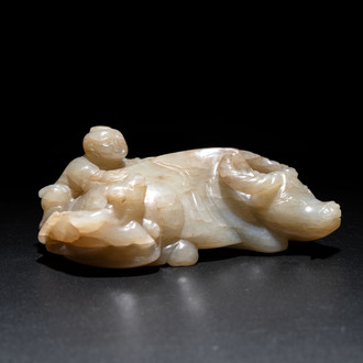 A Chinese jade 'boy on a buffalo' group, Qing
