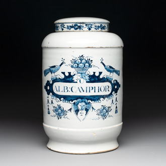 A rare large blue and white Dutch Delft albarello with original cover, 18th C.