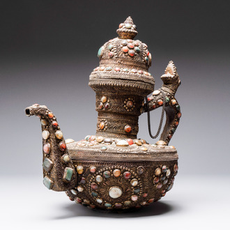 A massive Tibetan stone-inlaid copper filigree ewer and cover, 19/20th C.
