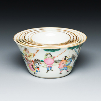 A set of seven Chinese famille rose nesting bowls with narrative design, Daoguang